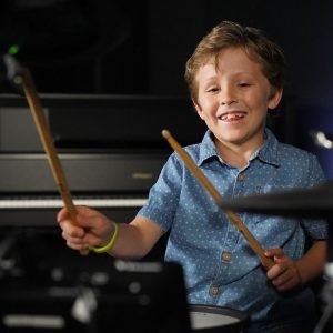 kid wants to learn the drums
